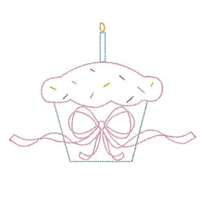 May include: A white cupcake with pink frosting and sprinkles, topped with a lit candle. The cupcake is tied with a pink ribbon and has a pink ribbon trailing off to the side.