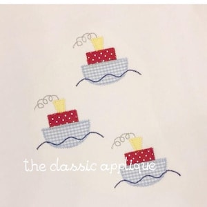 zigzag stitch tugboat trio with vintage stitch steam and wave embroidery design file