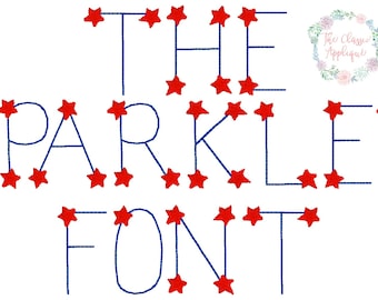 May include: The words "THE SPARKLER FONT" are spelled out in a blue outline with red stars filling in the letters.