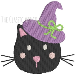 May include: Black cat with a purple witch hat and a green bow. The cat has white eyes and pink cheeks.