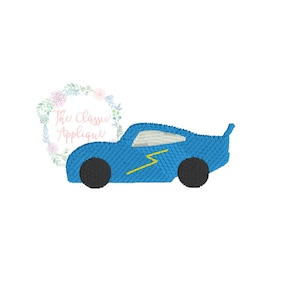 May include: A blue race car with a yellow lightning bolt design. The car has black wheels and a white windshield.