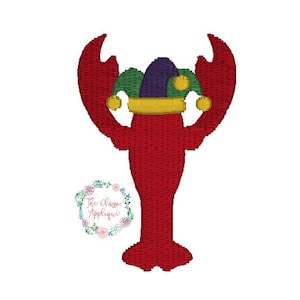 May include: Red lobster wearing a green, purple, and yellow jester hat.