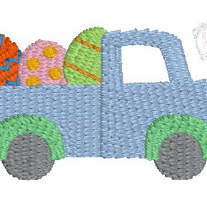May include: A blue toy truck with a green bed carrying three colorful Easter eggs. The eggs are orange, pink, and green with yellow spots.