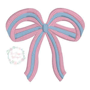 K&ouml;nnte beinhalten: Eine rosa und blaue Schleife mit einer mittleren Schleife. Die Schleife besteht aus zwei Stofflagen, wobei die obere Lage rosa und die untere Lage blau ist.