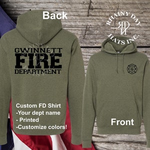 May include: An olive green hoodie featuring the text "GWINNETT FIRE DEPARTMENT" on the back and a fire department emblem on the front. The text "Custom FD Shirt - Your dept name - Printed - Customize colors!" is also visible.