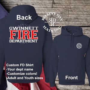 May include: Navy blue hooded sweatshirt with the text "GWINNETT FIRE DEPARTMENT" in white and red on the back and a white firefighter helmet logo on the front. The text "Custom FD Shirt - Your dept name - Customize colors! Adult and Youth sizes" is also on the back.