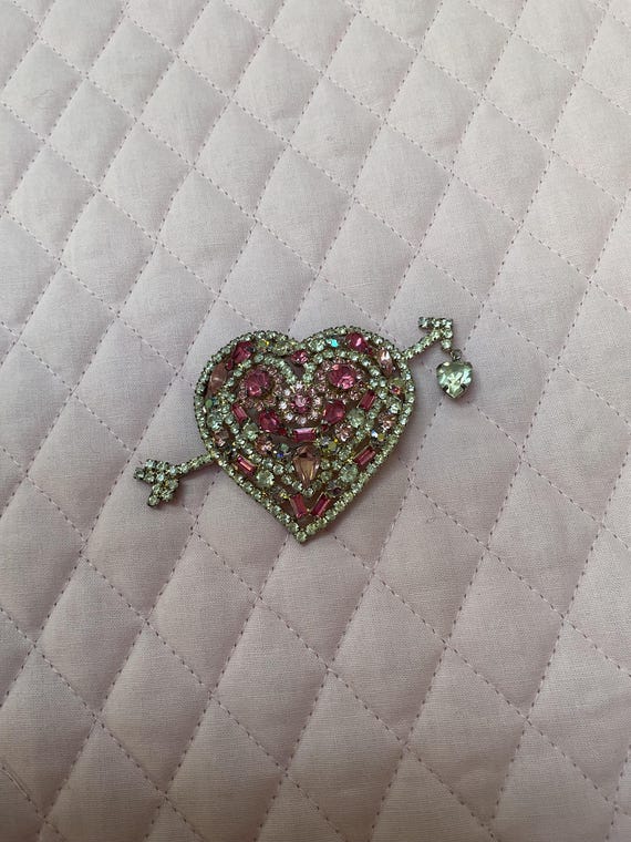 Heart shaped pin.