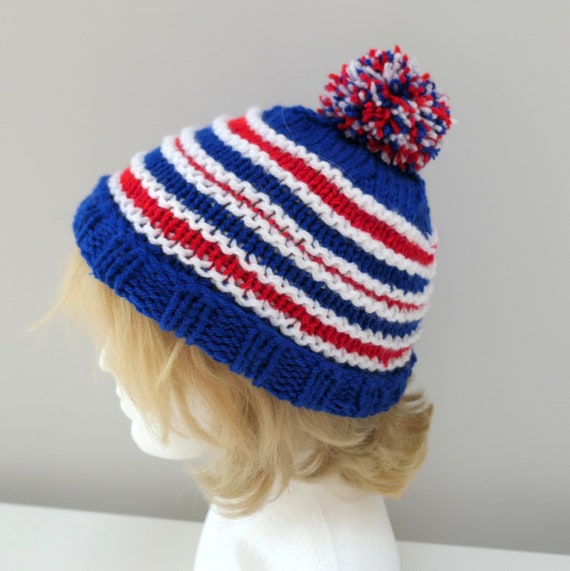 red and white bobble hat uk