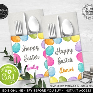 May include: Two printable Easter place cards with a white background and colorful Easter egg designs. The text "Happy Easter" is printed in gray, and the names "Emily" and "Daniel" are printed in pink and orange. The cards are designed to be used as place cards for an Easter dinner.