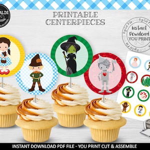 May include: Printable cupcake toppers featuring characters from the Wizard of Oz. The toppers include Dorothy, the Wicked Witch of the West, the Tin Man, and the Scarecrow. The toppers are on a white background with a blue and white checkered pattern. The text "Printable Centerpieces" is at the top of the image. The text "Instant Download You Print" is in a circle at the top right of the image. The text "Instant Download PDF File - You Print Cut & Assemble" is at the bottom of the image.