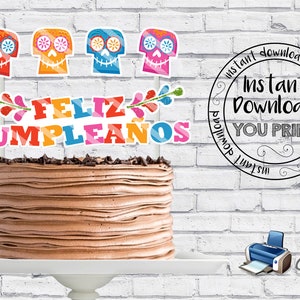 May include: Printable cake topper set featuring colorful sugar skulls and the text "Feliz Cumpleanos" in Spanish. The set includes four sugar skull toppers and one banner topper. The cake topper set is perfect for a Day of the Dead themed birthday party.