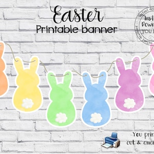 May include: Printable Easter banner featuring five watercolor bunny silhouettes in pastel colors, strung together with twine. The banner says "Easter Printable banner" and "You print, cut & assemble".
