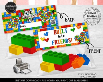 May include: Printable Valentine's Day card featuring a LEGO brick design. The front of the card says "Built to be Friends!" and the back says "Happy Valentine's Day!" with a space to write "From:". The card is 6.5 inches by 5 inches and folds to 6.5 inches by 2.5 inches.