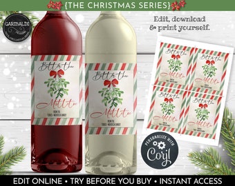 May include: Two wine bottles with red and white striped labels that say "Better than Mistletoe" with a watercolor illustration of mistletoe. The labels are for a Christmas party.