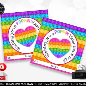 Może przedstawiać: Drukowane kartki walentynkowe z wzorem tęczowej zabawki pop-it z tekstem "Wishing you a POPPIN Valentine's Day".