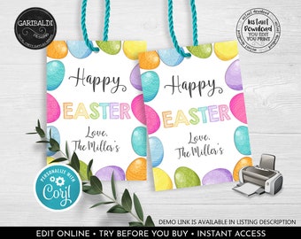 Puede incluir: Dos etiquetas de regalo de Pascua imprimibles con fondo blanco y diseños de huevos de Pascua coloridos. El texto en las etiquetas dice "Feliz Pascua" y "Con amor, Los Miller".