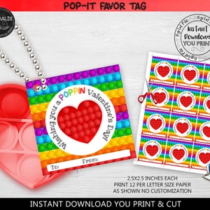 Może przedstawiać: Drukowane etykiety na prezenty walentynkowe z wzorem tęczy pop-it i czerwonym sercem w środku. Tekst brzmi "Wishing you a POPPIN Valentine's Day!" z miejscem na "To:" i "From:". Etykiety mają rozmiar 2,5 x 2,5 cala i drukują 12 na arkuszu papieru w formacie Letter.