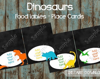 May include: Four printable food labels or place cards featuring a chalkboard background with dinosaur silhouettes. Each label has a white oval with the text "Add your text here". The dinosaurs are orange, blue, yellow, and green.