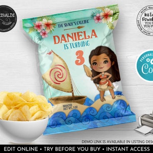 May include: A printable chip bag design featuring a cartoon illustration of a girl with long brown hair and a blue dress, standing on a beach with a sailboat. The text "The Snack's Calling" is at the top of the bag, and the text "Daniela is turning 3" is in the centre of the bag. The bag is decorated with tropical flowers and blue waves.