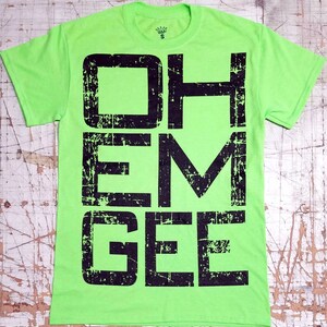 O.M.G. on Neon Green tee shirt
