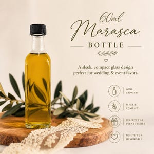 May include: A clear glass Marasca bottle with a black cap, filled with a yellow liquid. The bottle is 60ml in capacity. The image includes text that says "Marasca Bottle" and "perfect for wedding & event favors."