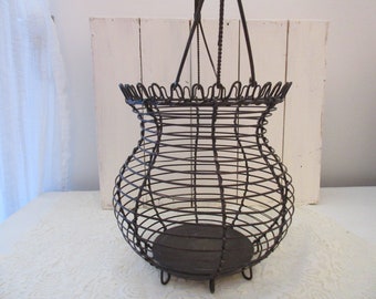 Vintage black metal egg basket