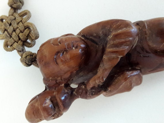 I'M HOI - Hand Carved Wooden Chinese Boy on Woven… - image 1