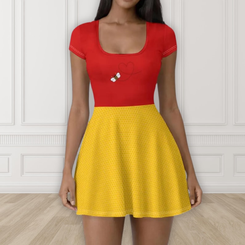 May include: A red skater dress with a yellow skirt. The top of the dress is red with a small bee graphic. The skirt is yellow with a dotted pattern. The dress has short sleeves and a scoop neckline.