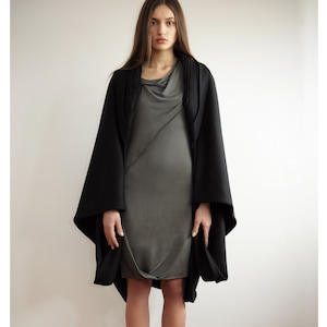 Black cape Dramatic style Staple piece draped on the back layered collar