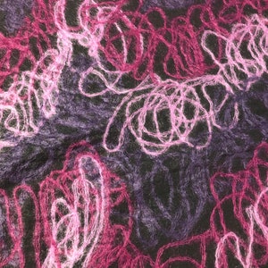 May include: A close-up of a fabric with a textured, abstract pattern. The fabric is a dark purple color with pink and white swirls and lines.