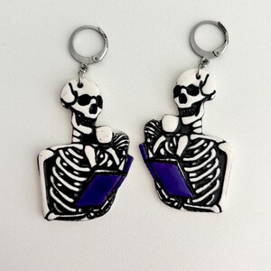 Skeleton Reading Book Earrings | Handmade Polymer Clay Jewelry | Spooky Cute Statement Earrings | Halloween Accessory | Stainless Steel