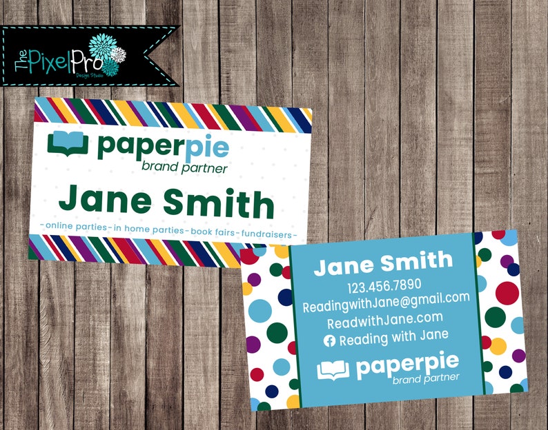 May include: Two business cards with a wooden background. One card features the name "Jane Smith" and "paperpie brand partner" with a colorful striped border. The second card has contact information and a polka dot design.
