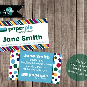 May include: Two business cards with the name "Jane Smith" and "paperpie brand partner" printed on them. One card has a colorful striped border, the other has polka dots. The cards are 3.5 x 2 inches.