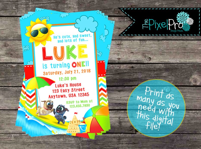 May include: A colorful birthday invitation for a boy named Luke turning one. The invitation features a cartoon sun wearing sunglasses, a beach scene with a sandcastle, and two cartoon dogs. The text reads "He's cute, and sweet, and lots of fun... LUKE is turning ONE!! Saturday, July 21, 2018 12:30 pm Luke's House 123 Easy Street Anytown, USA 12345 RSVP to Mom at 123.456.7890"