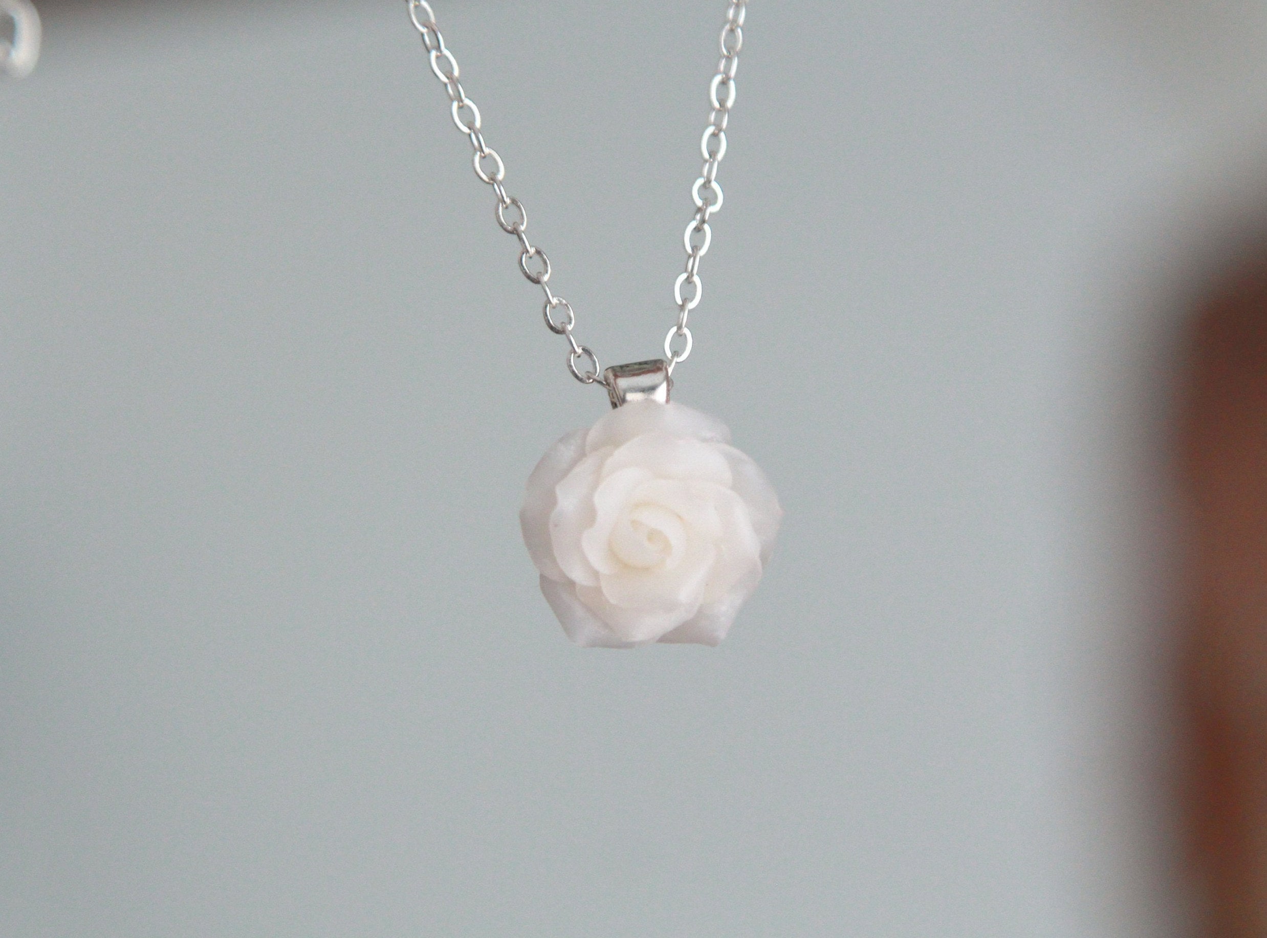 White shop rose pendant