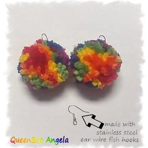 May include: Rainbow pom pom earrings with stainless steel ear wire fish hooks.  Made with stainless steel.