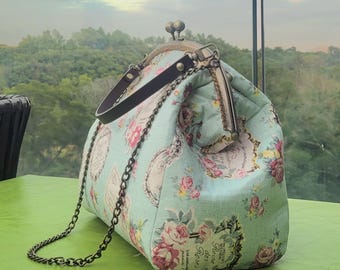 Parfum de roses print metal frame kiss lock shoulder bag / handbag