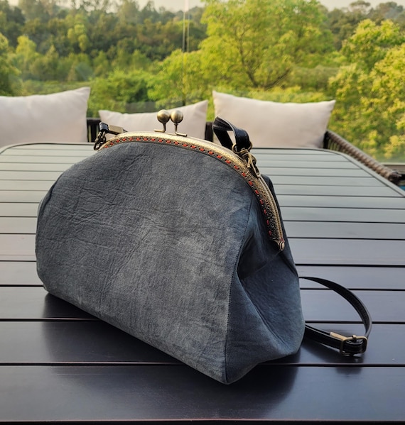 Sac à bandoulière ou à bandoulière en cuir de mouton retourné