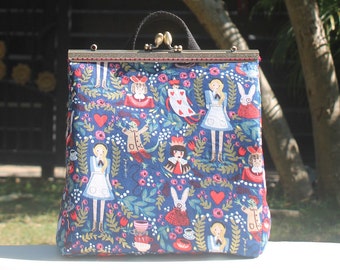 Alice in wonderland kiss lock convertible backpack or crossbody or shoulder-bag with metal knob clasp opening