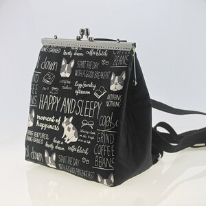 Bulldog print black backpack with kiss lock metal knob clasp opening