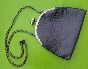 Soft dark brown leather crossbody with metal frame kiss lock and antique brass chain
