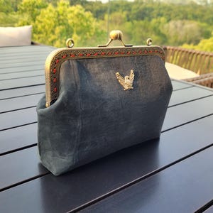 Genuine sheepskin suede leather eagle ornament purse / wallet / clutch bag / make up bag / pencil case with kiss lock metal clasp opening