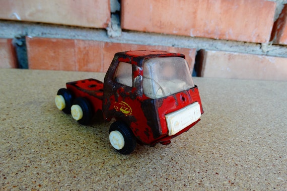 vintage red metal toy truck