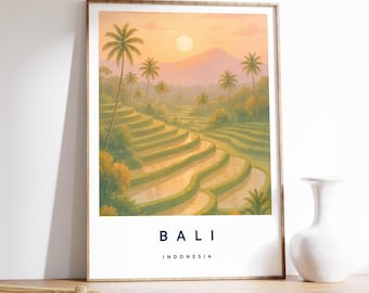 May include: A framed print featuring a serene landscape of Bali, Indonesia. The artwork depicts terraced rice fields, palm trees, and a mountain under a warm sunset. The word "BALI" and "INDONESIA" are printed at the bottom of the image.