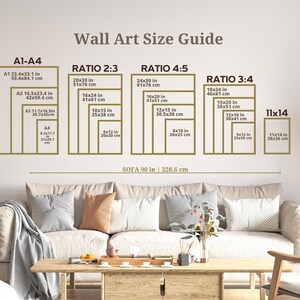 May include: A wall art size guide with different ratios and measurements in inches and centimeters. The guide shows the size of art pieces that would look good above a 90-inch sofa.