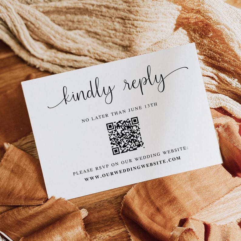 May include: A white card with black text that reads "kindly reply" in cursive. Below the text is "NO LATER THAN JUNE 13TH" and a black and white QR code. Below the QR code is the text "PLEASE RSVP ON OUR WEDDING WEBSITE: WWW.OURWEDDINGWEBSITE.COM"