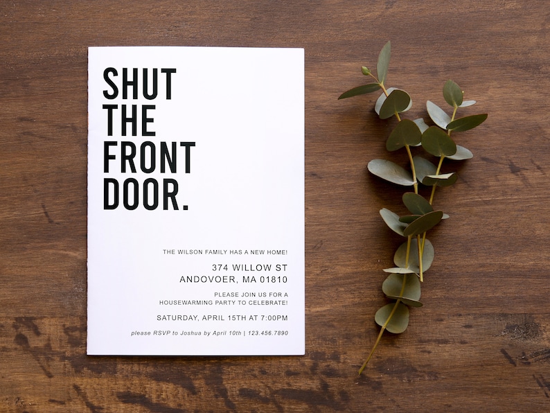 May include: A white card with black text that reads "SHUT THE FRONT DOOR." The card is a housewarming party invitation for the Wilson family at 374 Willow St, Andover, MA 01810. The party is on Saturday, April 15th at 7:00 PM. RSVP to Joshua by April 10th at 123.456.7890.