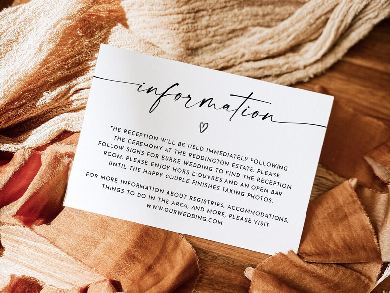 May include: White card with black text that reads "information" with a heart symbol. The text below reads "The reception will be held immediately following the ceremony at the Reddington Estate. Please follow signs for Burke wedding to find the reception room. Please enjoy hors d'oeuvres and an open bar until the happy couple finishes taking photos. For more information about registries, accommodations, things to do in the area, and more, please visit www.ourwedding.com"