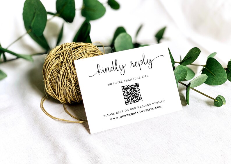 May include: White card with black text that reads "kindly reply" in cursive. Below the text is a black and white QR code with the text "NO LATER THAN JUNE 13TH". Below the QR code is the text "PLEASE RSVP ON OUR WEDDING WEBSITE: www.OURWEDDINGWEBSITE.COM"