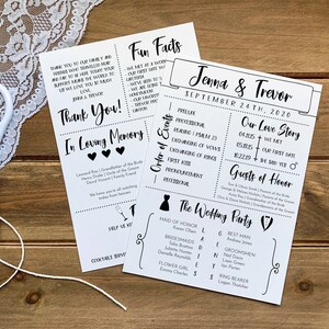 May include: Two printed wedding programs with black text on white paper, featuring the names "Jenna & Trevor" and wedding details. A pair of scissors and lace trim are visible on a wooden surface.